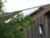 Un capteur solaire thermique posé en sur-toiture.